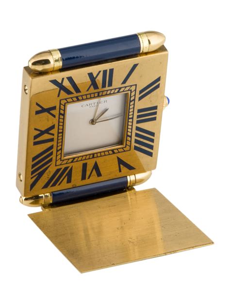 must de cartier travel clock.